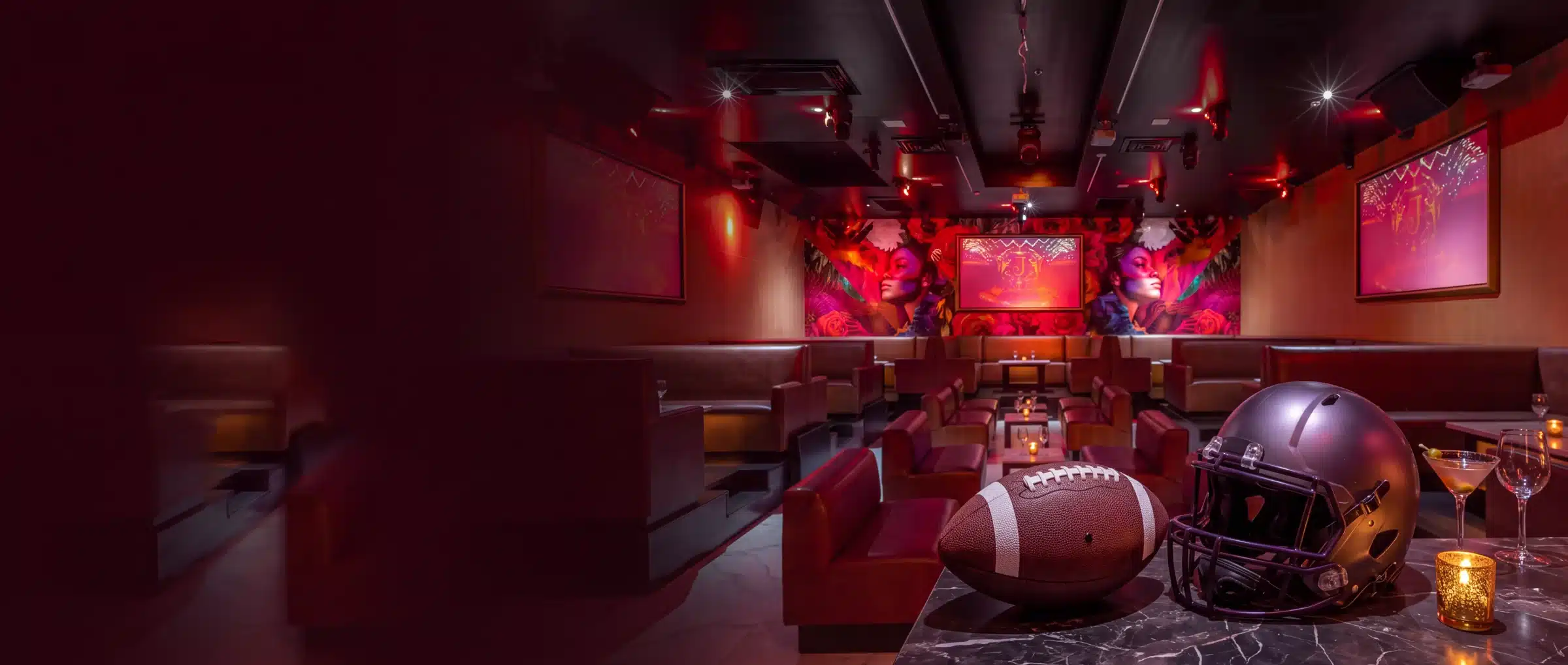 American football and helmet in Josephine’s burgundy lounge