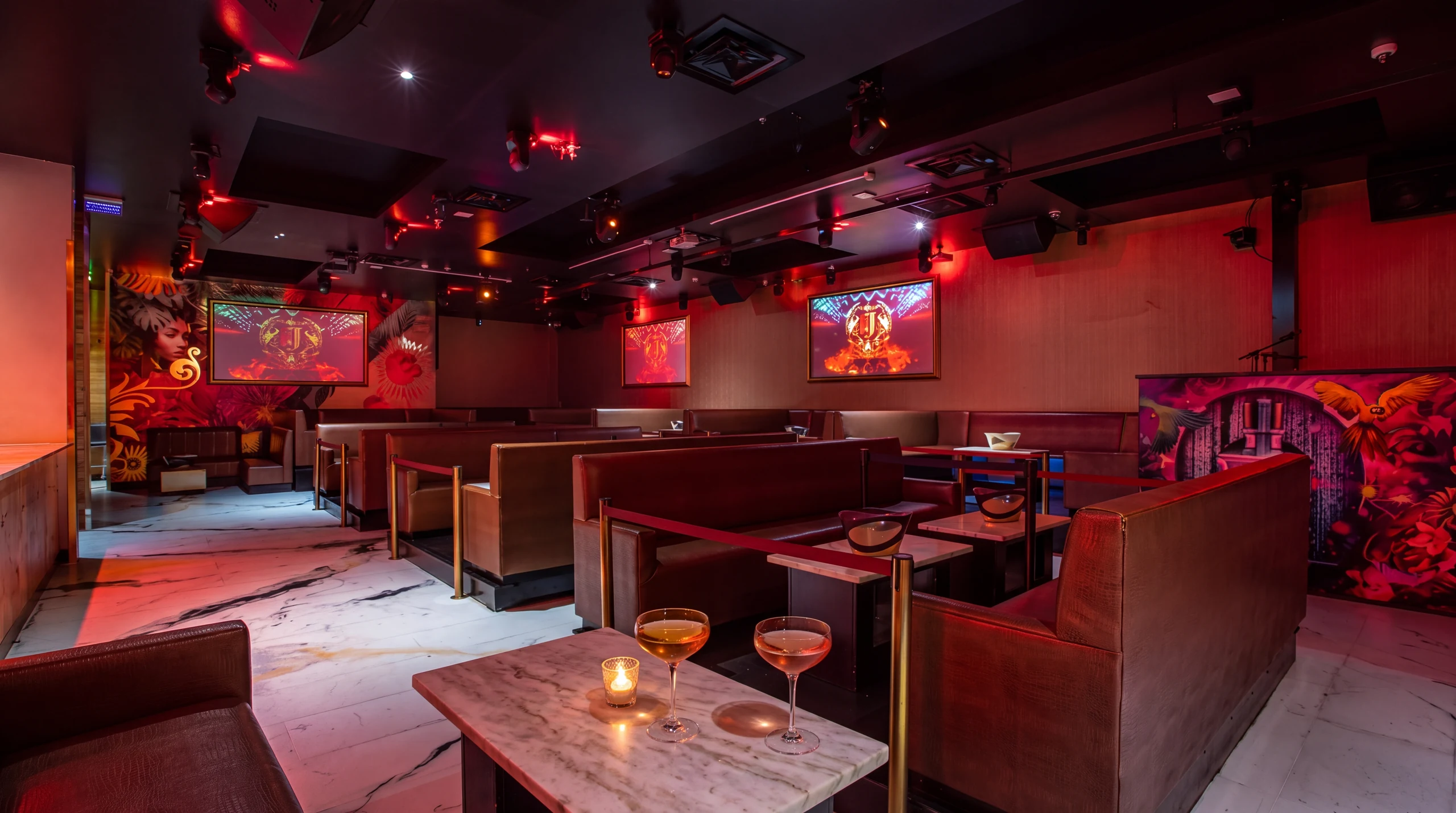 Josephine Lounge tables and burgundy booth seating